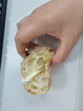 hand with bread