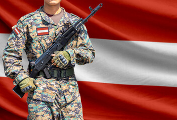 Obraz premium Austria flag with soldier holding assault rifle