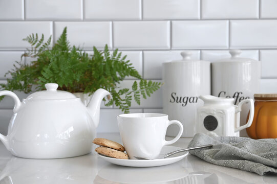 Tea and cookies in a white kitchen