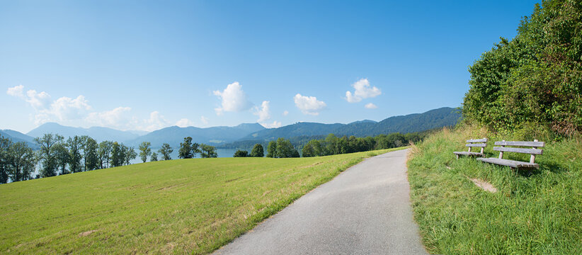 circular bike route lake Tegernsee. lookout point Gmund with benches. landscape bavaria