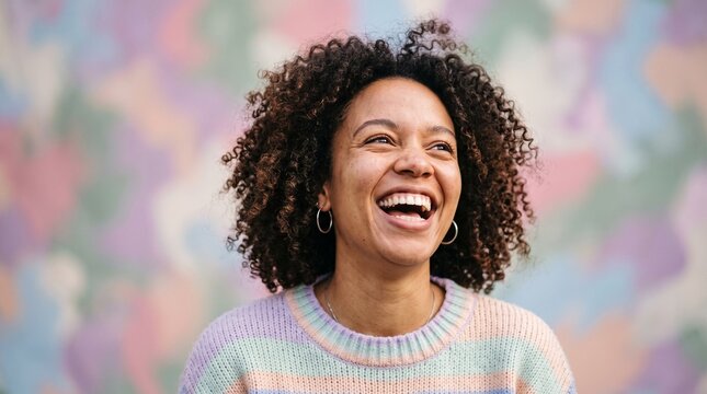 Happy Woman Laughing in a Colorful Pastel Setting