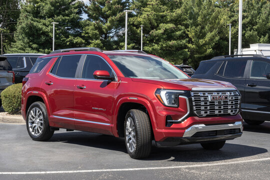 GMC Terrain Denali AWD Small SUV at a dealership. GMC offers the Terrain with a 1.5L Turbocharged 4-Cylinder engine. MY:2026
