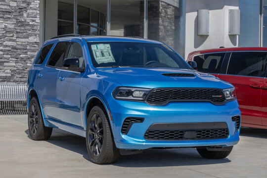 Dodge Durango GT Blacktop AWD 3-Row SUV at a dealership. Dodge offers the Durango with a 3.6L V6 Pentastar engine. MY:2026