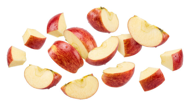 Falling red apple slices isolated on transparent background