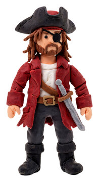 Handmade clay pirate figure with eye patch and sword on white background