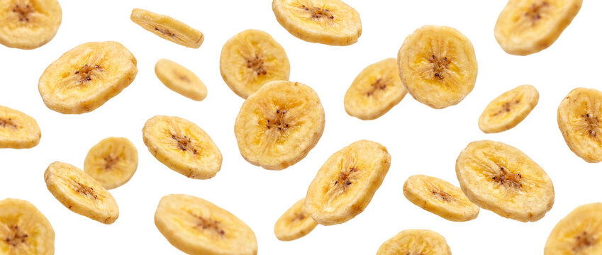 Falling dried banana chips isolated on transparent background