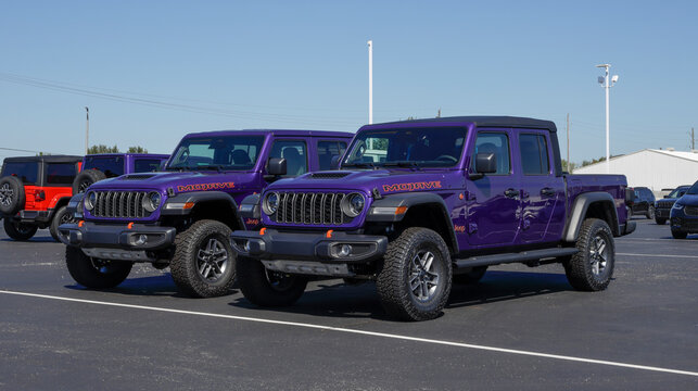 Jeep Gladiator Mojave 4X4 Pickup Truck at a dealership. Jeep offers the Gladiator with a 3.6L VVT V6 engine. MY:2026