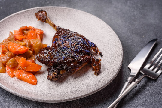 Duck leg confit roasted with salt and allspice. Duck leg confit