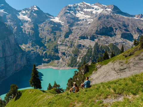 Explore breathtaking Oeschinensee in Switzerland with stunning mountain views