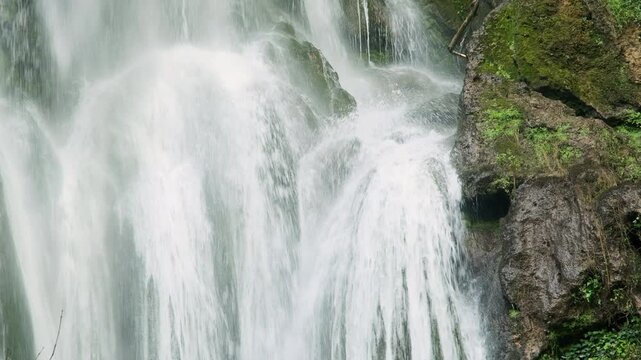The Cascade d'Autoire waterfall in summer. A 30 meter high waterfall near Autoire in Lot Occitanie Southern France	