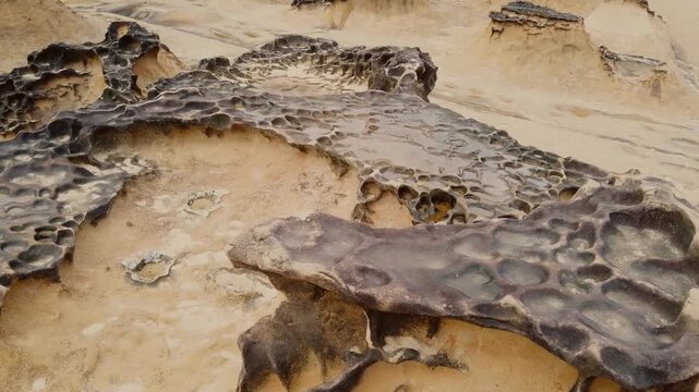 Trip to Yehliu Geopark in Taiwan. Beautiful travel video in Taipei. Nature landscape with sandy erosion mountains. Summer vacation at famous park.