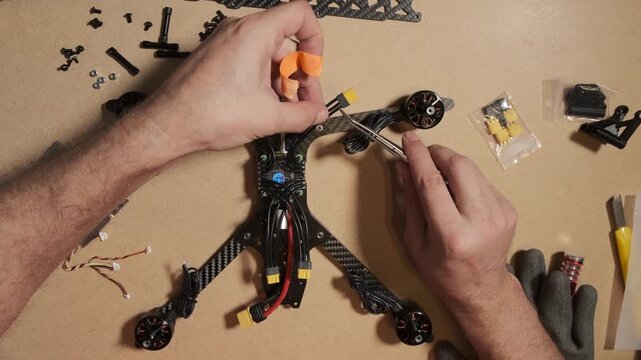 Assembling Carbon Fiber FPV Racing Drone Frame with Electronics