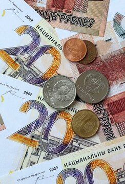 Belarusian ruble money banknotes and coins on table. Belarus cash bills of BYN currency