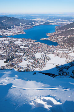 view from the Wallberg summit to snowy valley and lake Tegernsee. upper bavaria in winter