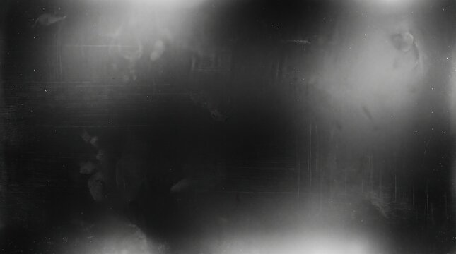 Aged black film frame texture with light leaks and dust particles