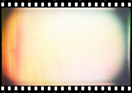 35mm photo film strip vignette template with light leak, dusts and scratches, A4 aspect ratio red glare page template with transparent background (PNG image)	
