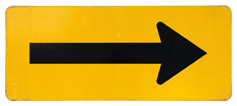 Weathered yellow right-pointing directional arrow sign