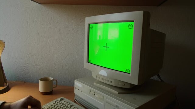 Retro pc computer gaming, Desktop vintage with loading code console, programmer making scripts, green basic screen, Old computer studio close-up, retro wave display, late 90s PC.