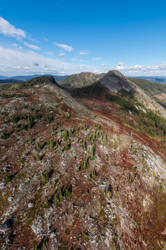 Aerial Mountain Landscape in British Columbia Canada With Rocky Peaks and Alpine Forests