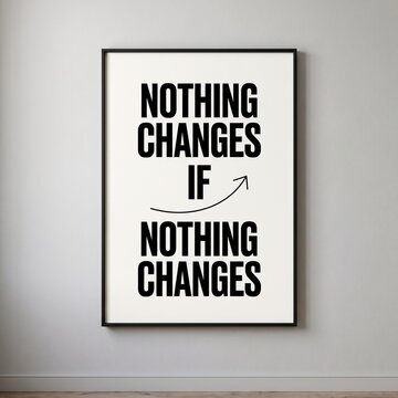 Minimalist black and white typography poster featuring the motivational quote Nothing Changes If Nothing Changes hanging on a grey wall.