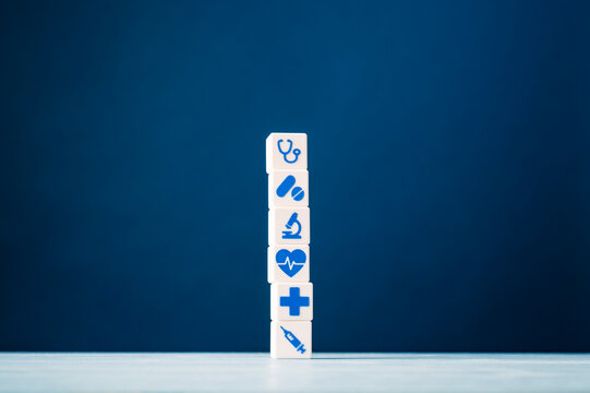 Healthcare and medical services concept with stacked medical symbol cubes