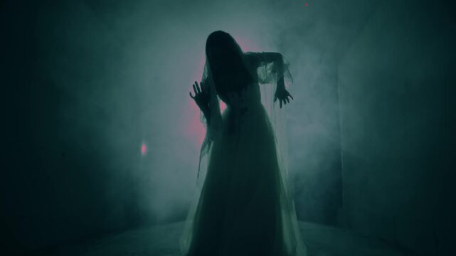 Halloween Witch casting a spell with candles during an exorcism ritual, scary sorceress in Halloween costume performing dark magic, spooky horror movie atmosphere.