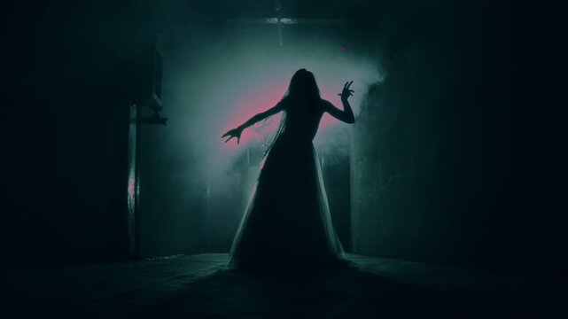 Halloween Witch casting a spell with candles during an exorcism ritual, scary sorceress in Halloween costume performing dark magic, spooky horror movie atmosphere.