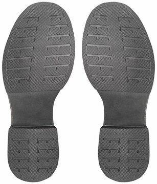 Isolated photo of black rubber male classic shoe sole on white background.