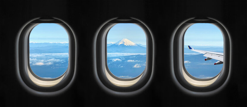View of Japan's Mount Fuji outside the airplane window.	