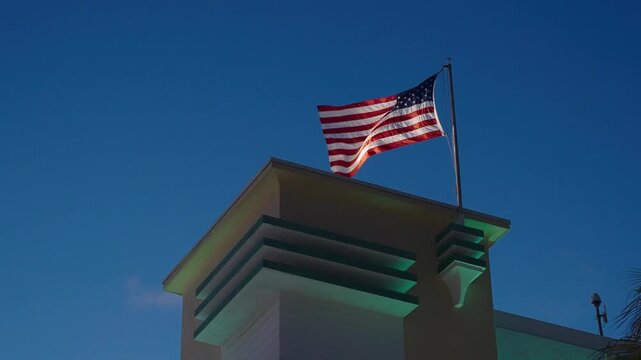 American flag waving in the wind. Flag of the USA. National waving flag of united states outdoor. Independence day. Patriotic symbol. American Flag for Memorial Day or 4th of July