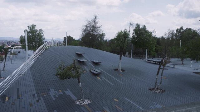 Mantarraya Park wide shot in Los Fuertes area of Puebla featuring modern wooden architecture on hill