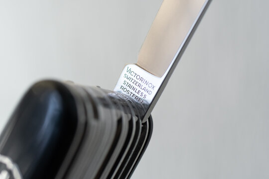 ZAPOPAN, MEXICO - SEPTEMBER 10, 2026: Macro detail of Victorinox blade tang stamp reading Switzerland Stainless Rostfrei.