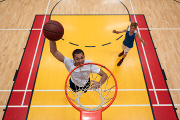 Dynamic basketball dunking action photo © Rawpixel.com