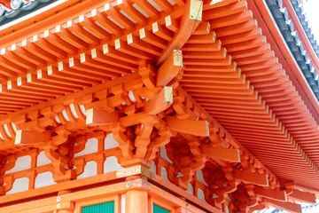 Fotobehang Rood 朱色の仏塔の軒下  © 木村　亨