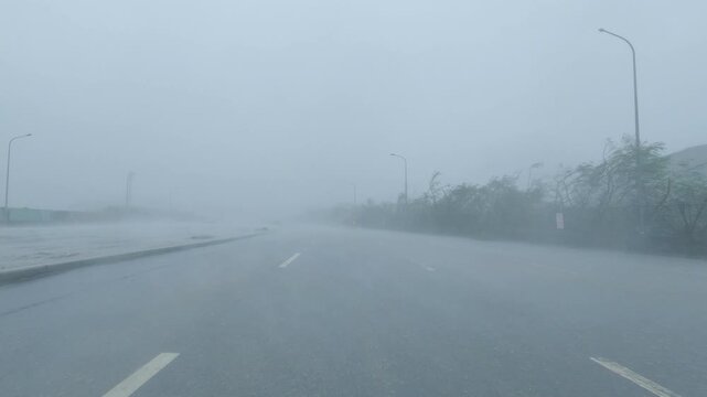 Hurricane Force Winds And Torrential Rain Batter Road During Drive