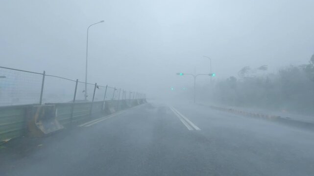 Car Battles Intense Hurricane Winds And Driving Rain Across City