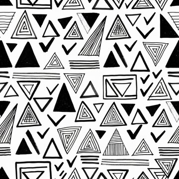 Hand-drawn geometric pattern with triangles and abstract shapes on white background.