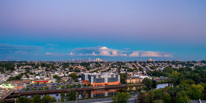 Aerial panorama of Lyndhurst New Jersey at dusk with New York City skyline