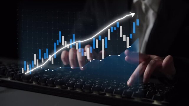 Professional individual analyzes financial data on keyboard with graphical representation of upward trends and statistics in a modern business environment. Copula