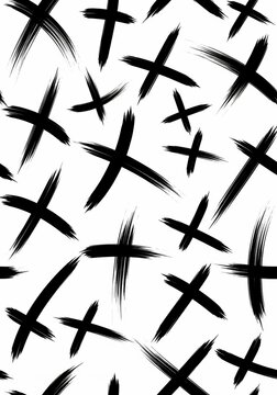Abstract black brush stroke crosses pattern on white background
