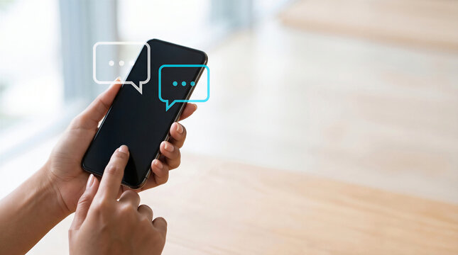 Woman holding a smartphone with digital chat bubble icons floating above the screen 