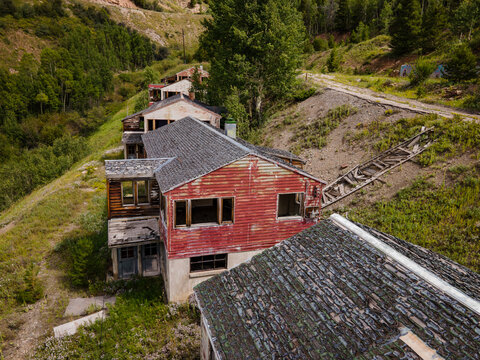 Red house with open windows