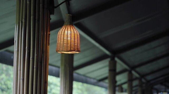 Woven light fixture in bamboo restaurant area
