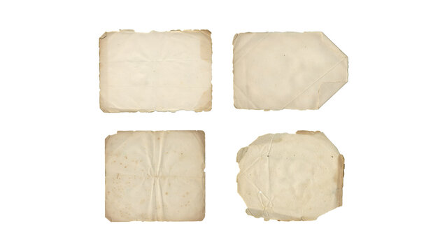 Set of four old vintage paper sheets with torn edges and folds isolated on white background