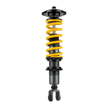 Automotive coilover shock absorber suspension unit on transparent background