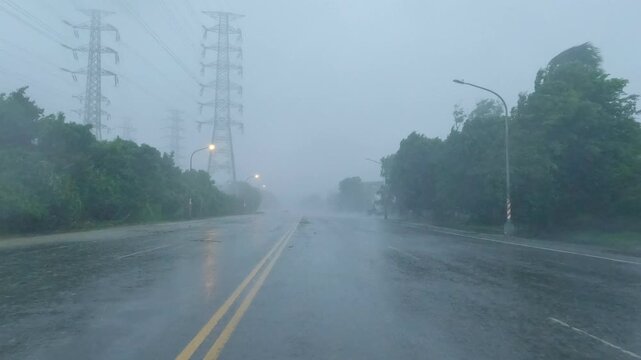 Driving Through Powerful Winds And Blinding Rain During Hurricane
