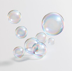 Obraz premium Colorful floating soap bubbles on white background