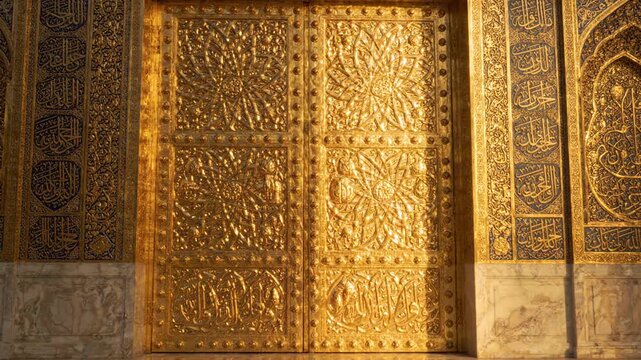 Ornate golden doors of an Islamic mosque with Arabic calligraphy.