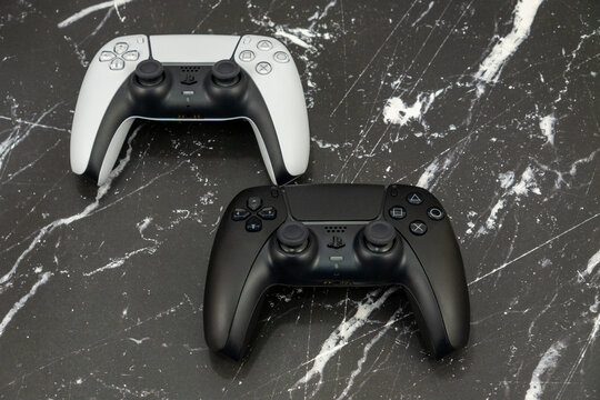 Bogota, Colombia - August 2026 Playstation 5 dualsense controllers black and white