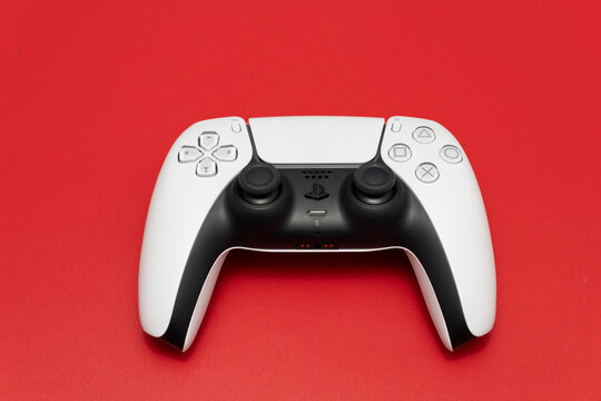 Bogota, Colombia - August 2026 Playstation 5 dualsense controller on red background